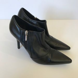 Guess heel black boots size 9 1/2 .